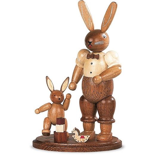 Easter bunny father with playing child, small natural