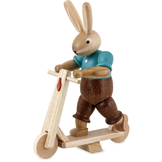 Easter bunny boy on scooter, small colored-stained