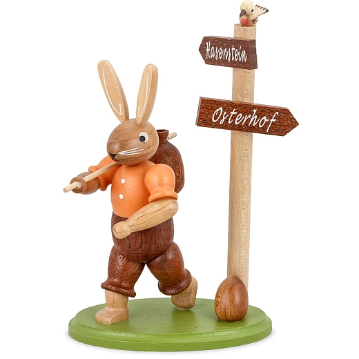 Easter bunny hiker at signpost, small colored-stained