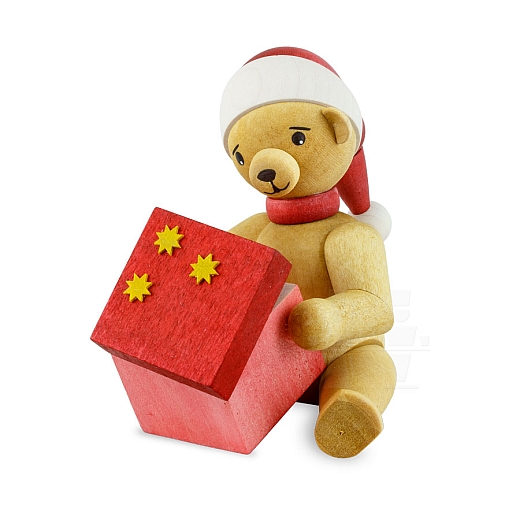 Christmas bear sitting with gift