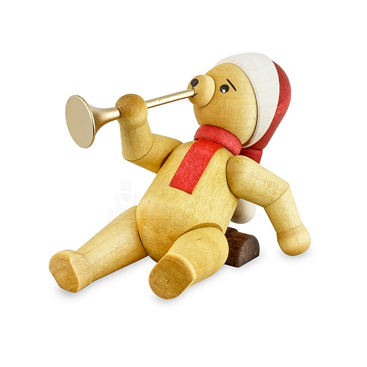 Christmas bear lying with Trumpet