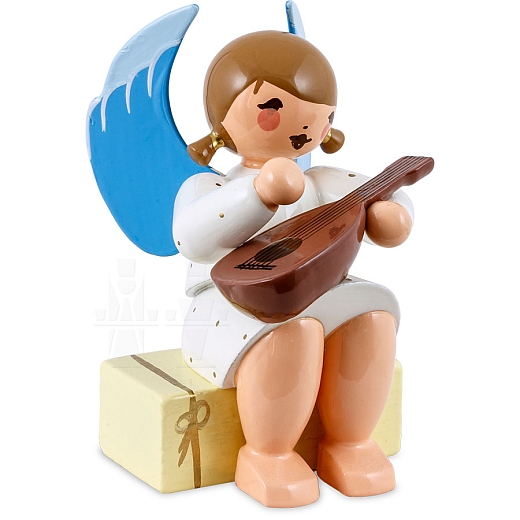 Angel sitting on gift package with Mandolin white
