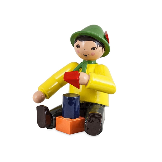 Boy sitting with Building Blocks