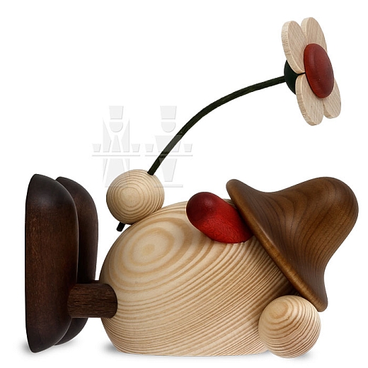 Eierkopf Oskar mit Blume liegend braun