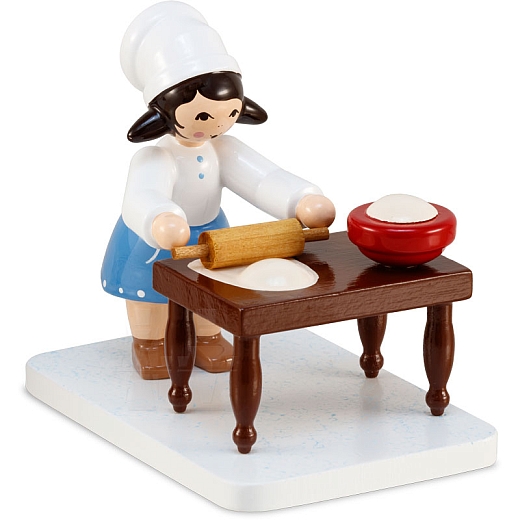 Winter child cookie baker girl blue with table from Ulmik